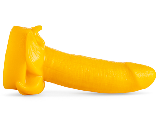 Yellow banana-shaped dildo lying on its side
